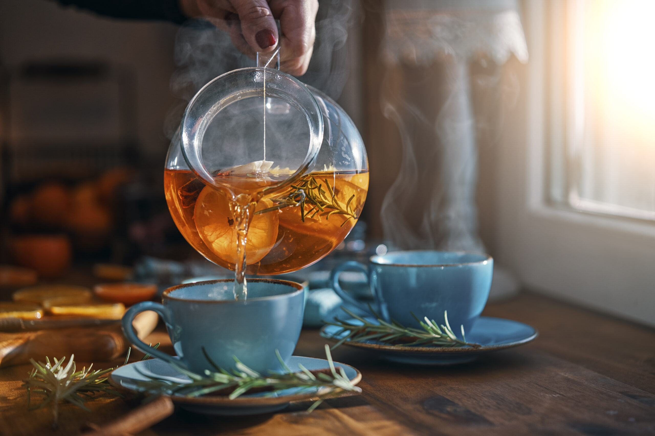 fruit tea with oranges, cinnamon and rosemary